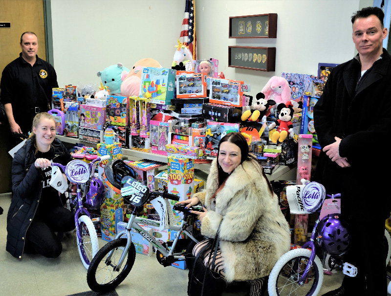The Lloyd Police shared the toys they collected with representatives of the Grace Smith House and the local children in Highland. Pictured L-R Lt. James Janso, Simone Berry, Youth Advocate, Nina Schutzman, Community Development Coordinator and Chief Daniel Waage.